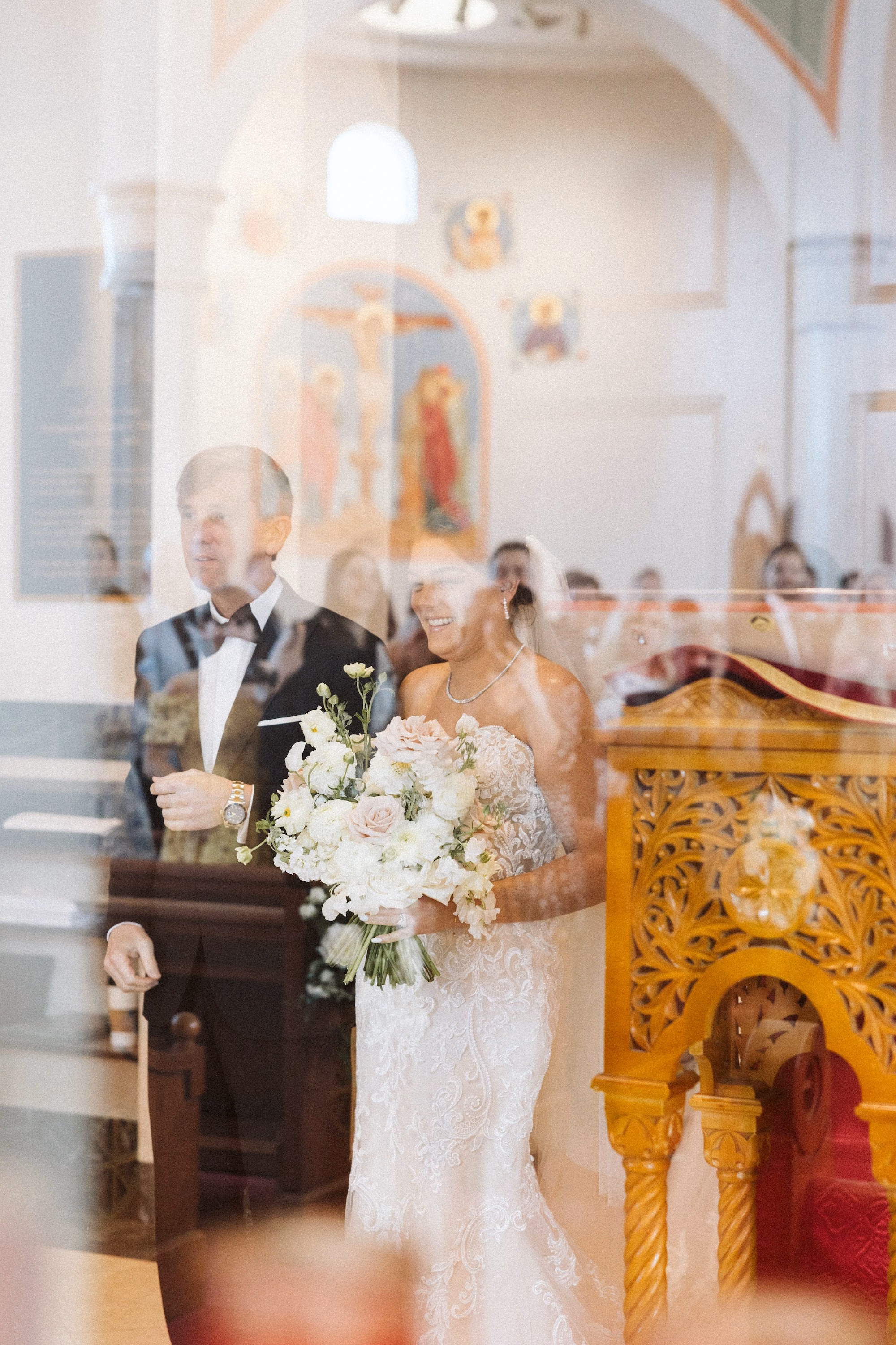 13Luxurious Romantic Garden Ballroom Wedding Inspiration - Luxurious Garden-Inspired Naples Wedding | Hyatt Regency Coconut Point Bride and Father Walking Down Wedding Ceremony Aisle | Traditional Greek Orthodox Wedding Ceremony Inspiration | Gold Iconography and White Floral Altar Decor Ideas | Bonita Springs Venue St. Katherine Greek Orthodox Church