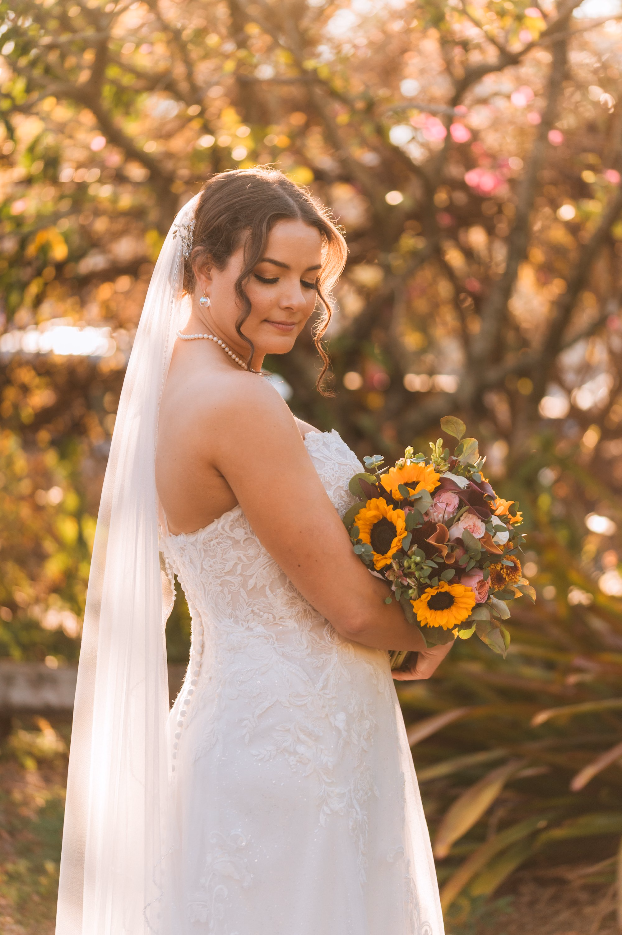 14St Pete Museum Outdoor Garden Ceremony Venue Duncan McClellan Gallery - Neon Disco Meets Old Florida St. Pete Wedding | FloridaRAMA Bride Wedding Portrait | Strapless Lace Wedding Dress with Short Veil and Lace Floral Train Inspiration | Sunflower Bridal Bouquet Ideas