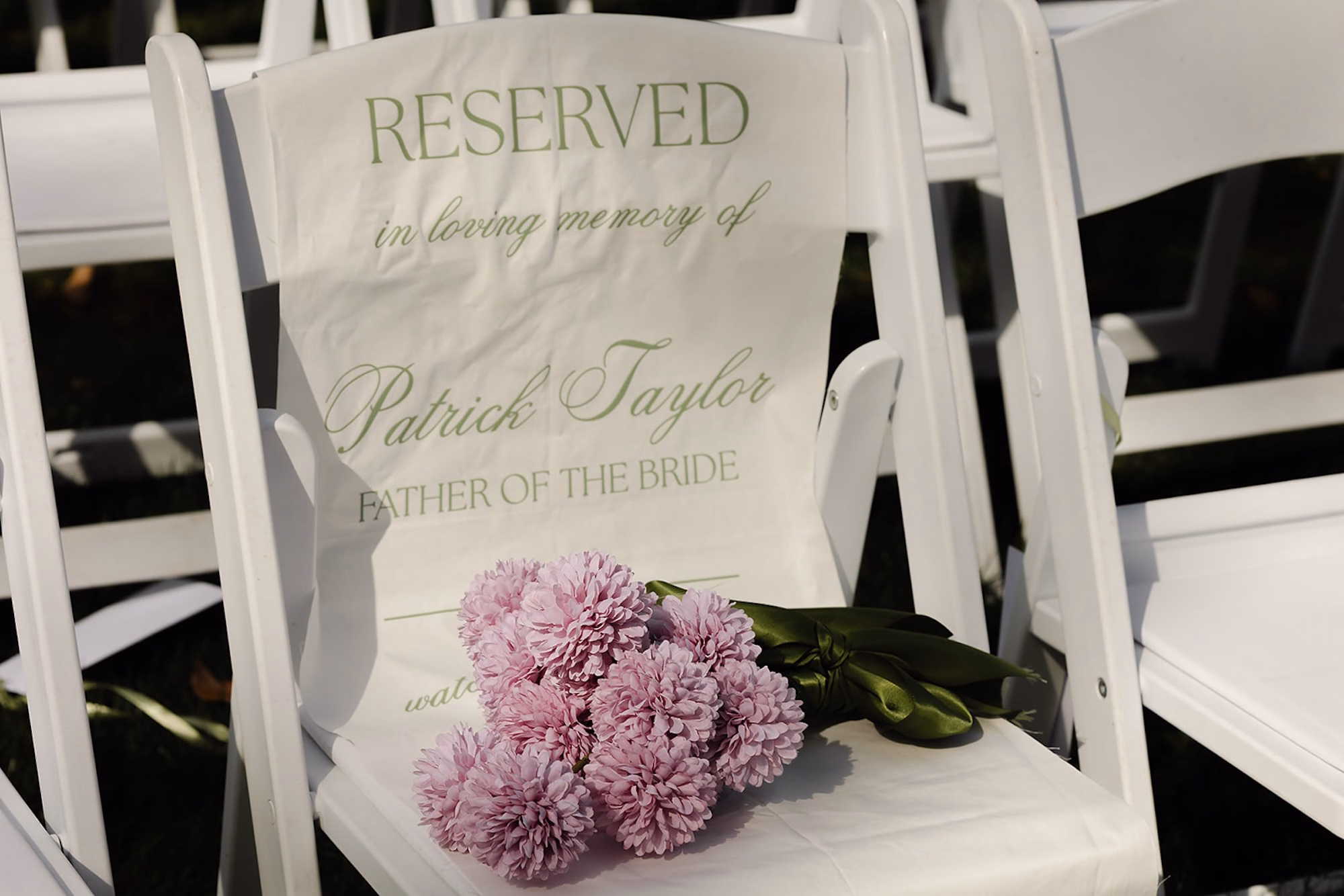 Reserved in Loving Memory Fabric Chair Sign with Lavender Mums on White Folding Chair Ideas