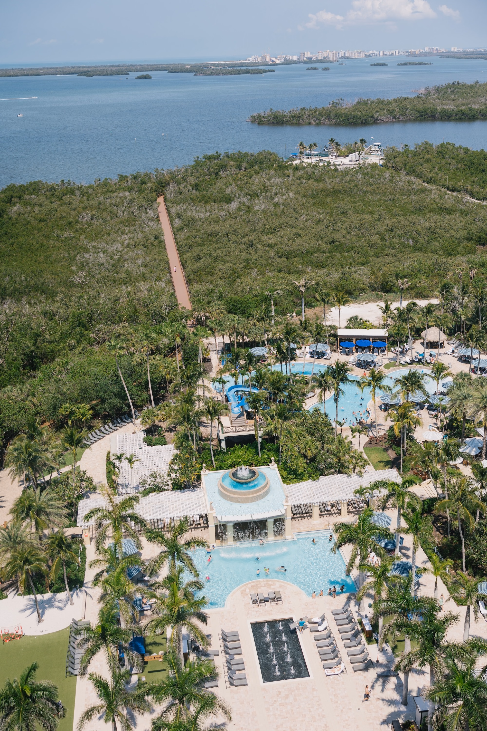 1Luxurious Romantic Garden Ballroom Wedding Inspiration Bonits Springs Venue Hyatt Regency Coconut Point - Luxurious Garden-Inspired Naples Wedding | Hyatt Regency Coconut Point Aerial View of Tropical Resort Wedding Venue with Lagoon Pools, Palm Trees and Waterfront | Luxury Southwest Florida Resort Wedding Inspiration | Bonita Springs Venue Hyatt Regency Coconut Point | Planner Parties A’ La Carte