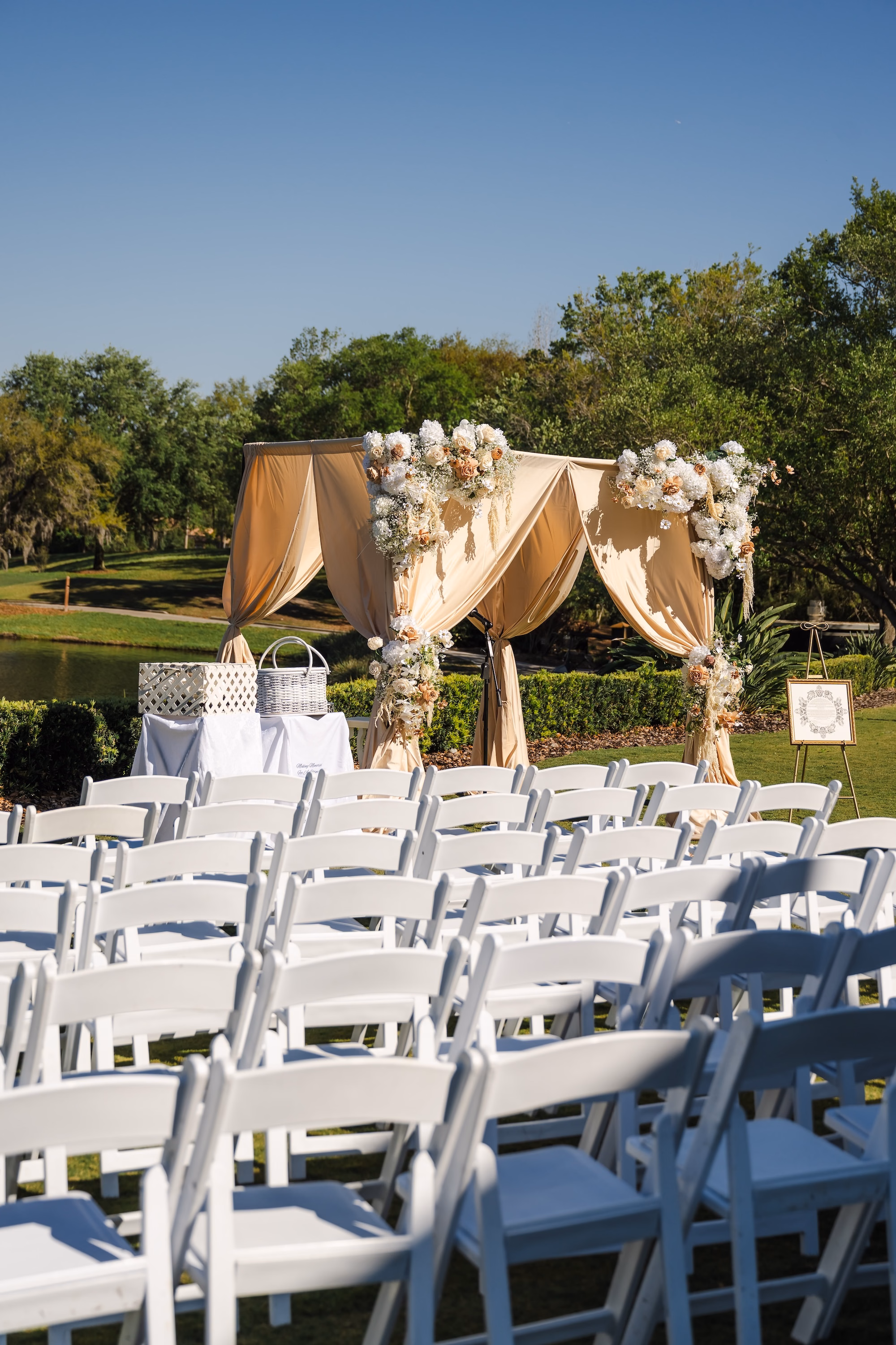 21Romantic Gold and Ivory Florida Wedding Ideas - Romantic Ivory and Gold Sarasota Wedding | Lakewood Ranch Golf & Country Club Champagne Draped Chuppah with Blush and Cream Floral Arrangements Traditional Jewish Wedding Ceremony Decor Inspiration | White Folding Chairs for Country Club Ceremony Ideas