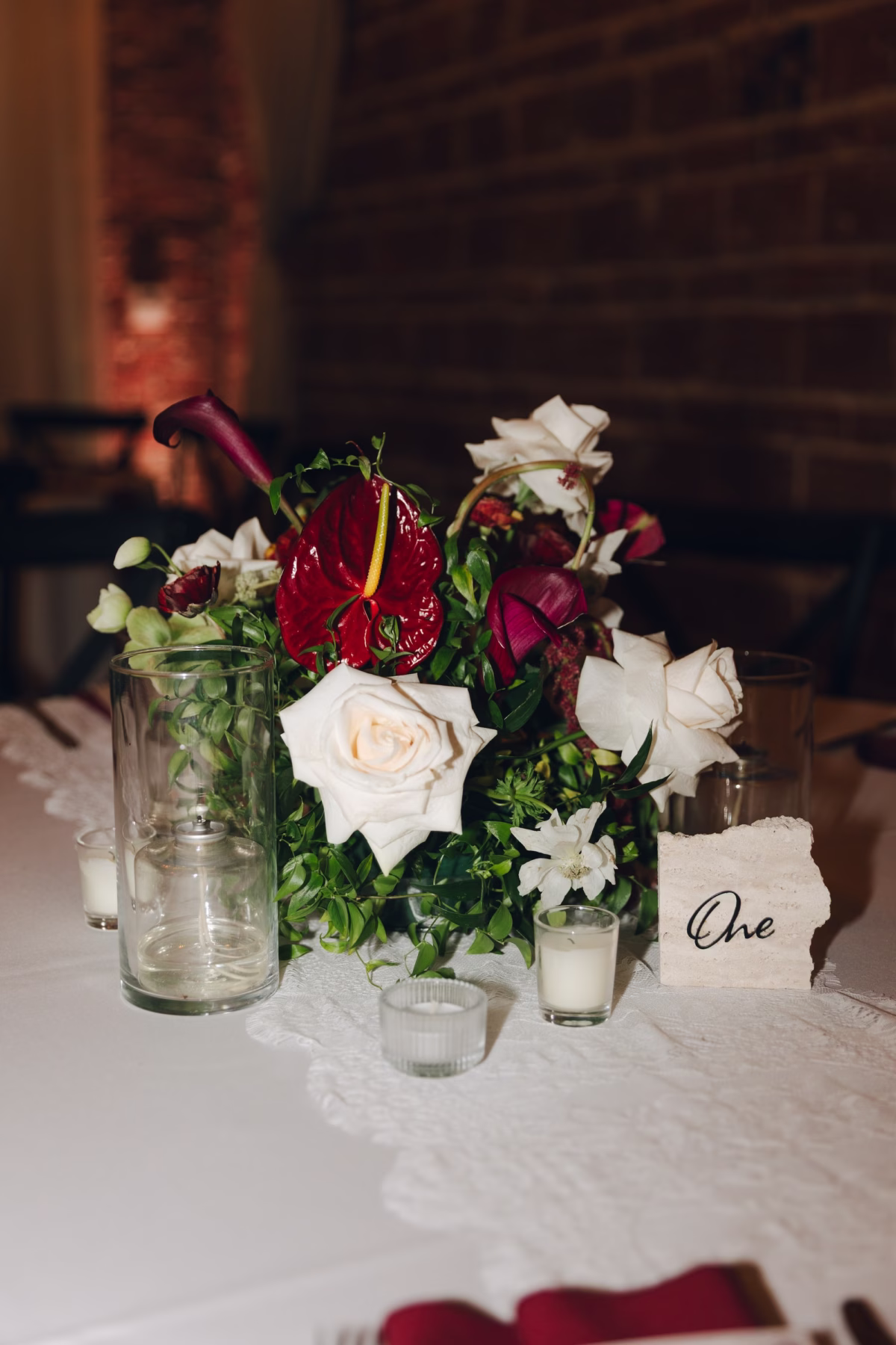 23Burgundy Vintage Romance Wedding Ideas - Vintage Romance Pink and Burgundy Downtown St. Pete Wedding | NOVA 535 Burgundy Anthurium, White Rose and Orchid Bud Vase Centerpiece with Script Table Number Card Decor Ideas