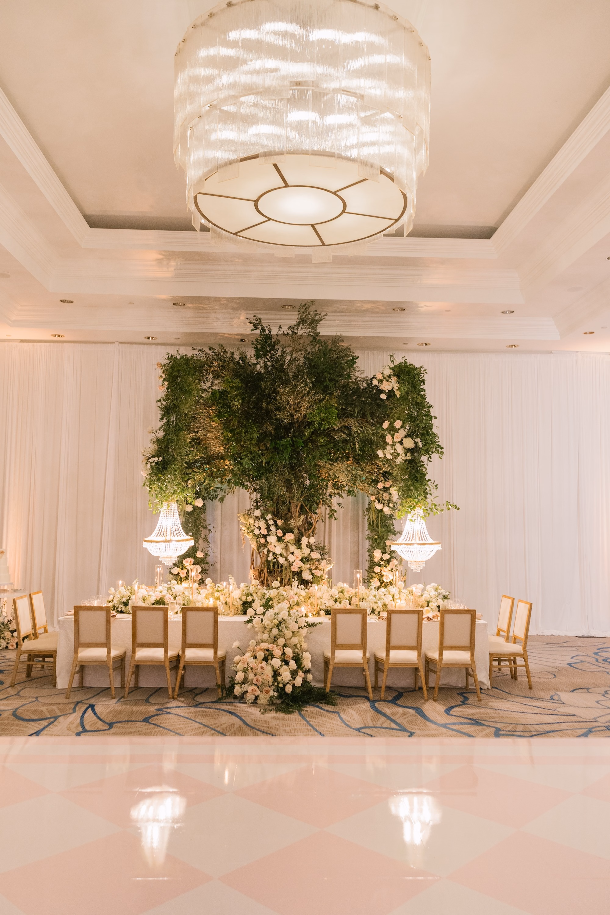 30Luxurious Romantic Garden Ballroom Wedding Inspiration Bonits Springs Venue Hyatt Regency Coconut Point - Luxurious Garden-Inspired Naples Wedding | Hyatt Regency Coconut Point Ballroom Wedding Reception with Greenery Installation and Statement Chandelier | Luxury Ballroom Wedding Decor Inspiration | Blush Draping and Gold Chair Ideas | Bonita Springs Venue Hyatt Regency Coconut Point | Planner Parties A’ La Carte