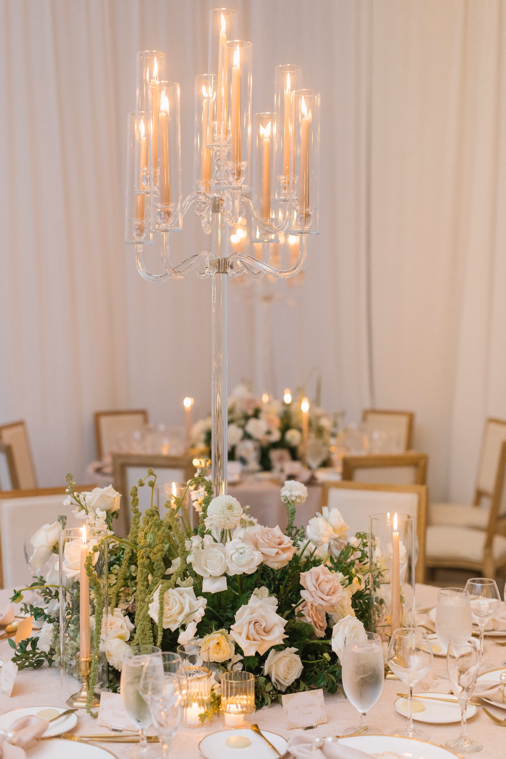 31Luxurious Romantic Garden Ballroom Wedding Inspiration - Luxurious Garden-Inspired Naples Wedding | Hyatt Regency Coconut Point Wedding Reception Table Candelabra Centerpiece Detail | Crystal Candelabra with White and Blush Florals Inspiration | Romantic Candlelit Reception Decor Ideas | Bonita Springs Venue Hyatt Regency Coconut Point | Planner Parties A’ La Carte