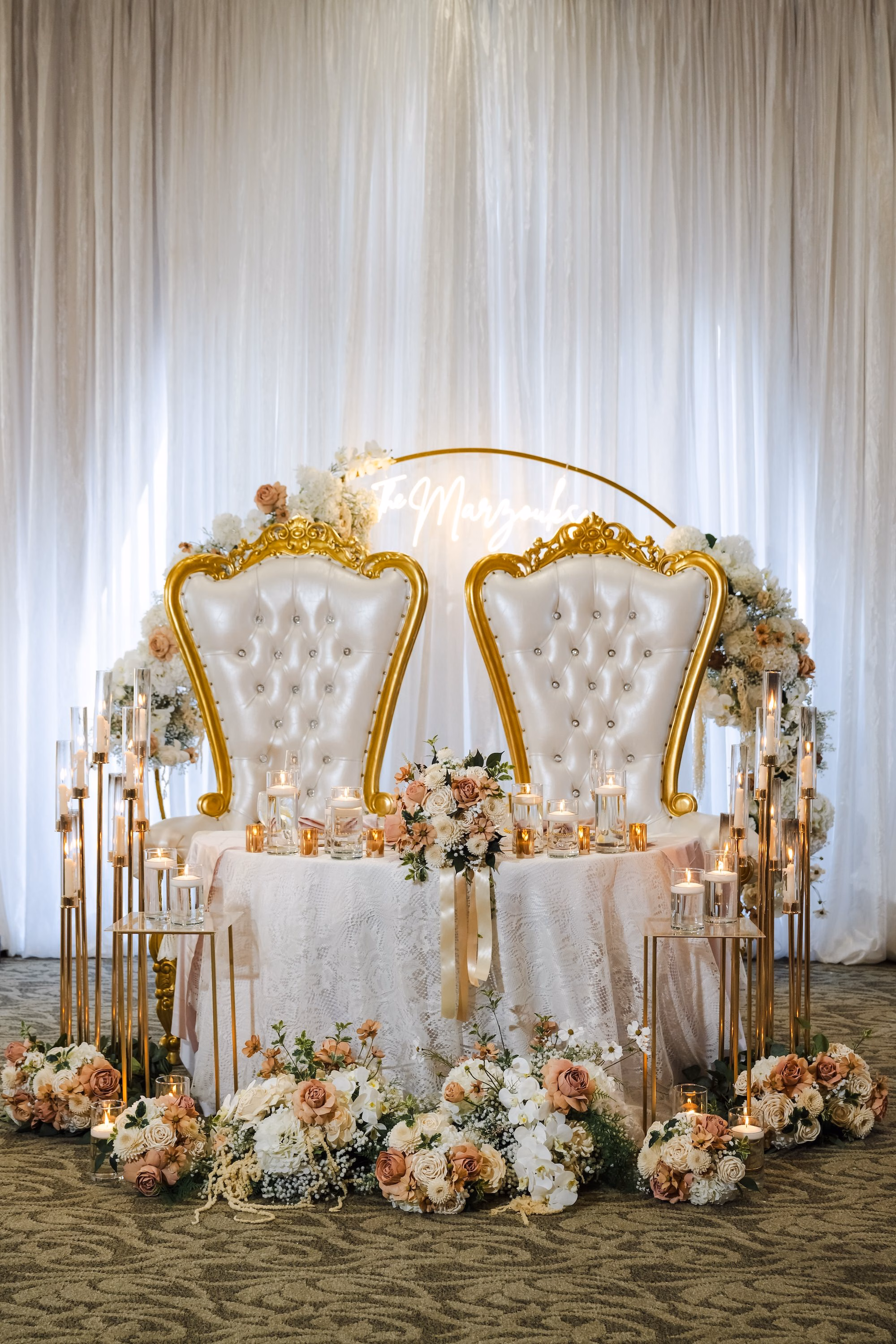 35Romantic Gold and Ivory Florida Wedding Ideas - Romantic Ivory and Gold Sarasota Wedding | Lakewood Ranch Golf & Country Club Romantic Sweetheart Table with White Draping, Gold King and Queen Throne Chairs Ballroom Wedding Reception Decor Ideas | White, Ivory and Blush Floral Garland Decor Inspiration | White Lace Textured Wedding Linens Ideas | Gold and White Taper Candles Decor Inspiration