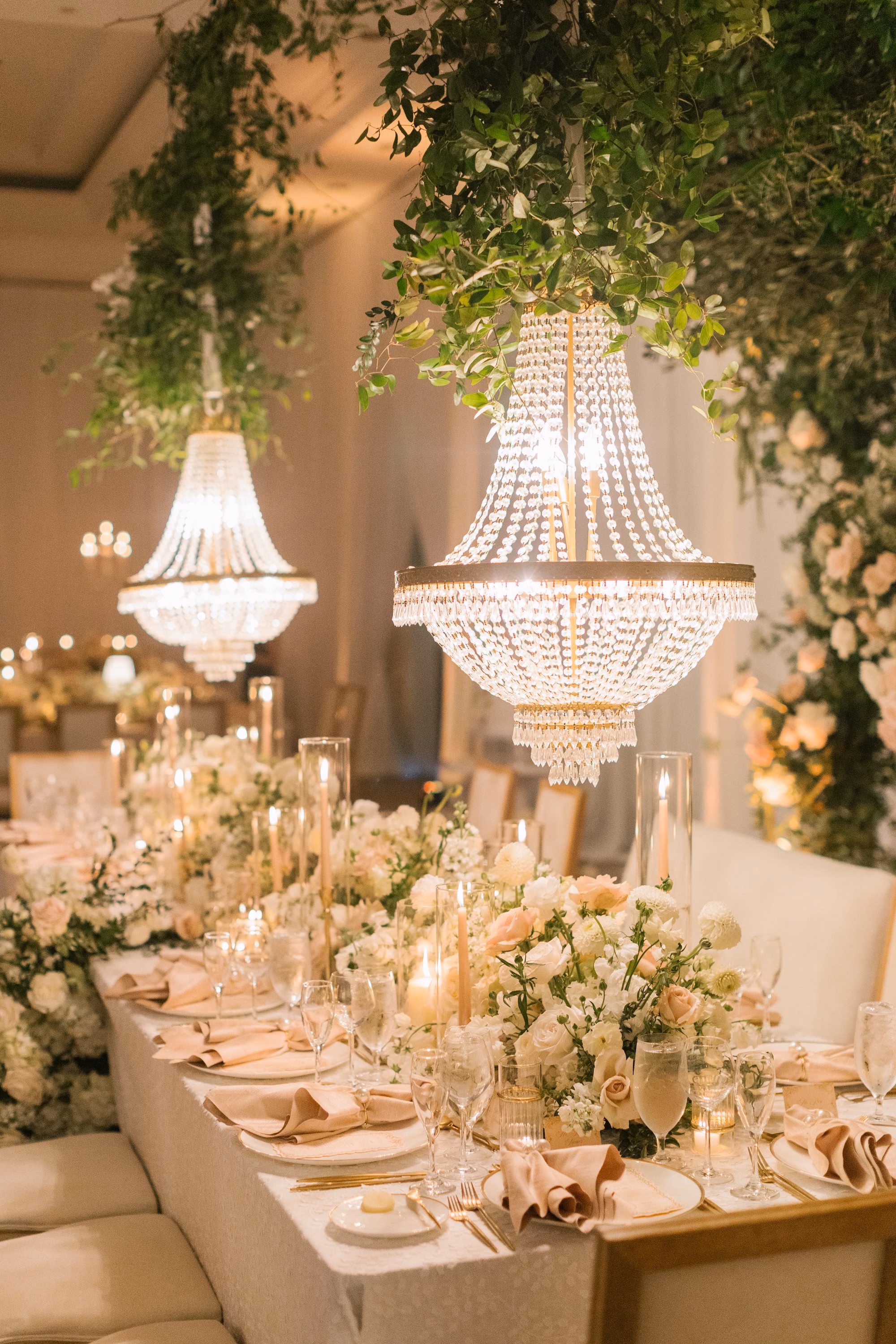39Luxurious Romantic Garden Ballroom Wedding Inspiration - Luxurious Garden-Inspired Naples Wedding | Hyatt Regency Coconut Point Long Feasting Table Wedding Reception with Crystal Chandeliers and Greenery Canopy | Garden Inspired Luxury Reception Decor Inspiration | White and Blush Floral Runner Ideas | Bonita Springs Venue Hyatt Regency Coconut Point | Planner Parties A’ La Carte