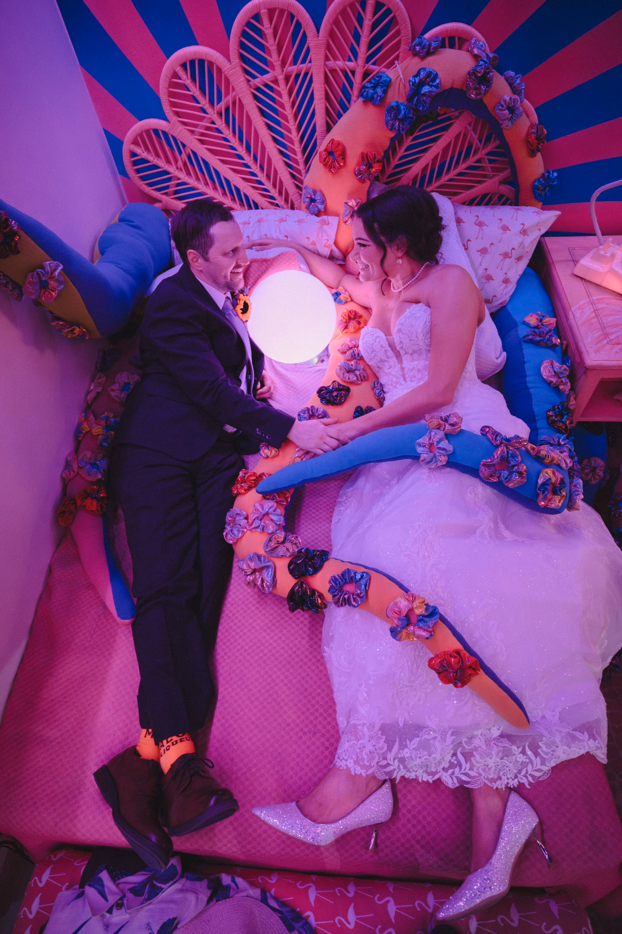 39Vibrant Disco Themed Wedding Inspiration St Pete Musuem Venue FloridaRAMA - Neon Disco Meets Old Florida St. Pete Wedding | FloridaRAMA Bride and Groom Wedding Portrait | Hot Pink Disco Wedding Decor Inspiration | St. Pete Immersive Art Museum Wedding Venue FloridaRAMA