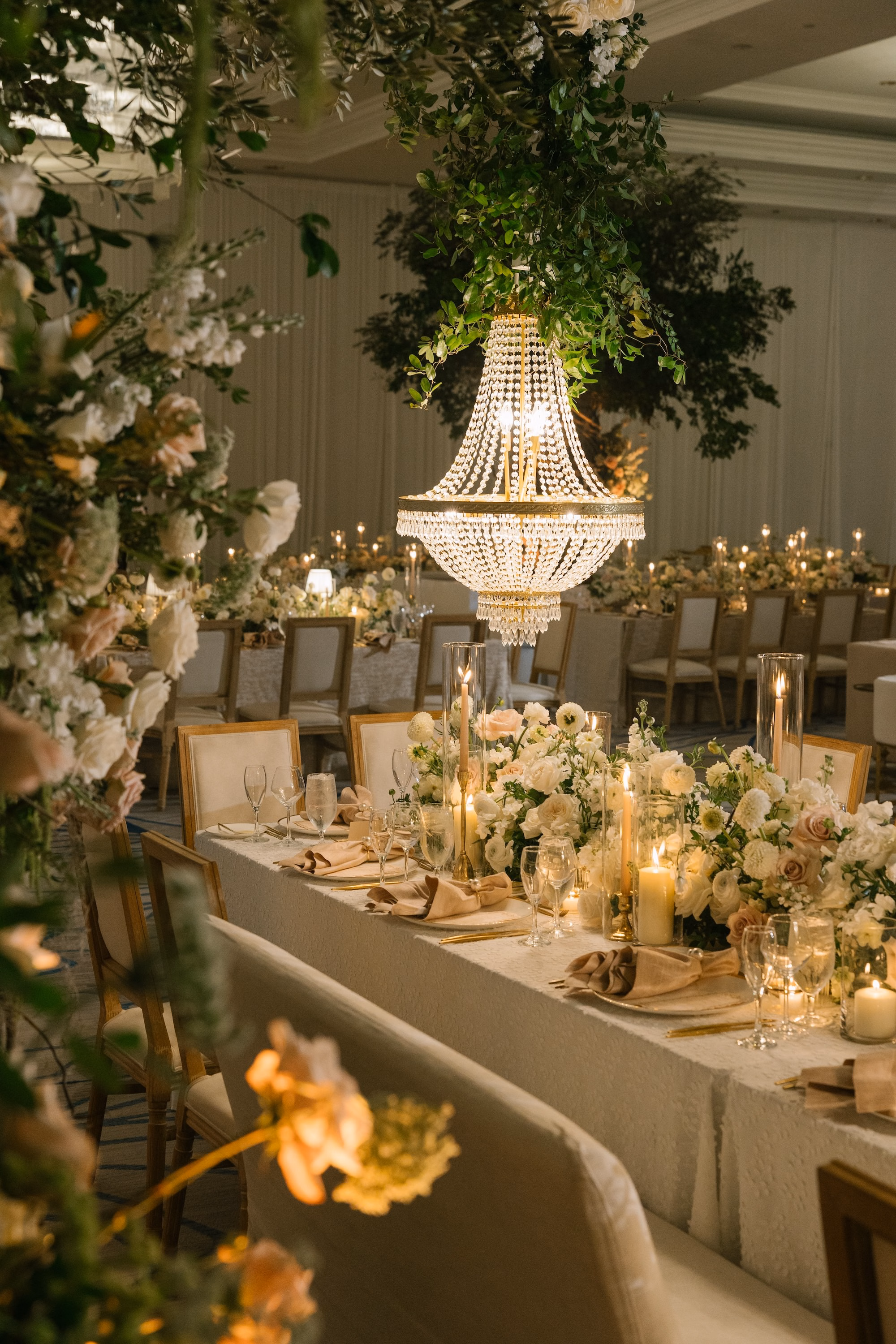 42Luxurious Romantic Garden Ballroom Wedding Inspiration Bonits Springs Venue Hyatt Regency Coconut Point - Luxurious Garden-Inspired Naples Wedding | Hyatt Regency Coconut Point Long Feasting Table Wedding Reception with Crystal Chandeliers and Greenery Canopy | Garden Inspired Luxury Reception Decor Inspiration | White and Blush Floral Runner Ideas | Bonita Springs Venue Hyatt Regency Coconut Point | Planner Parties A’ La Carte