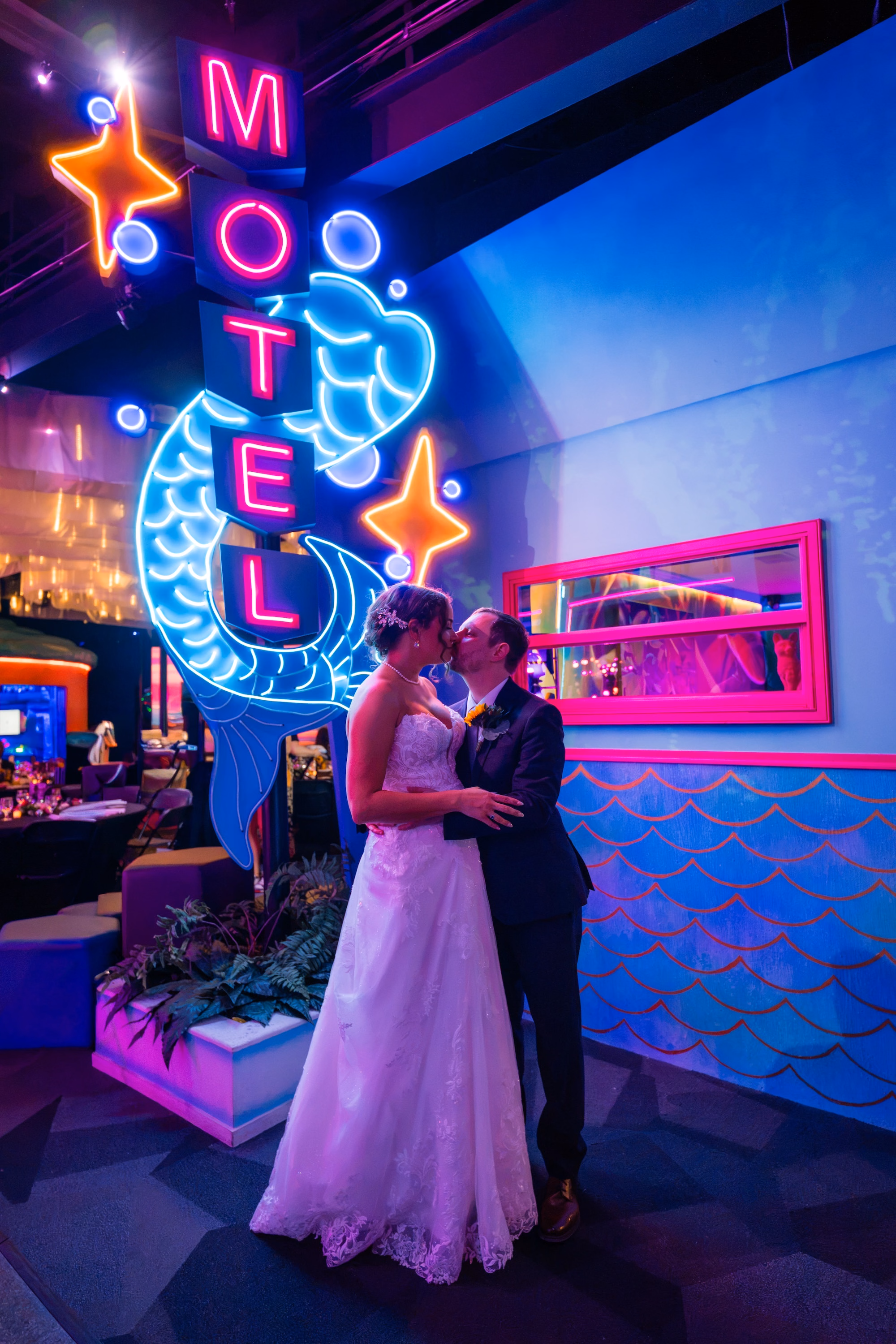 42Vibrant Disco Themed Wedding Inspiration St Pete Musuem Venue FloridaRAMA - Neon Disco Meets Old Florida St. Pete Wedding | FloridaRAMA Bride and Groom Wedding Portrait Under Neon Motel Sign | Unique Wedding Venue St. Pete FloridaRAMA