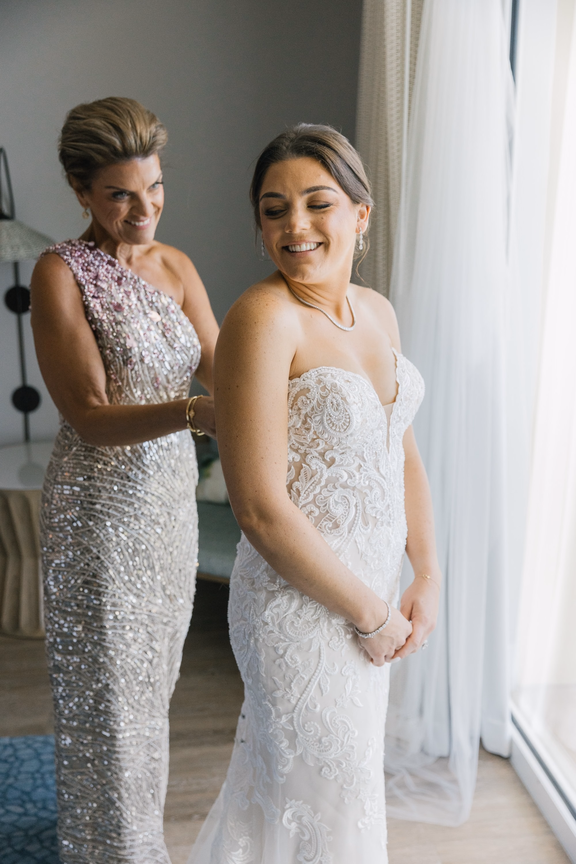 4Luxurious Romantic Garden Ballroom Wedding Inspiration - Luxurious Garden-Inspired Naples Wedding | Hyatt Regency Coconut Point Mother of the Bride and Bride Getting Ready Wedding Portrait | Strapless Sweetheart Lace Mermaid Wedding Dress Inspiration | Elegant Bridal Suite Getting Ready Ideas